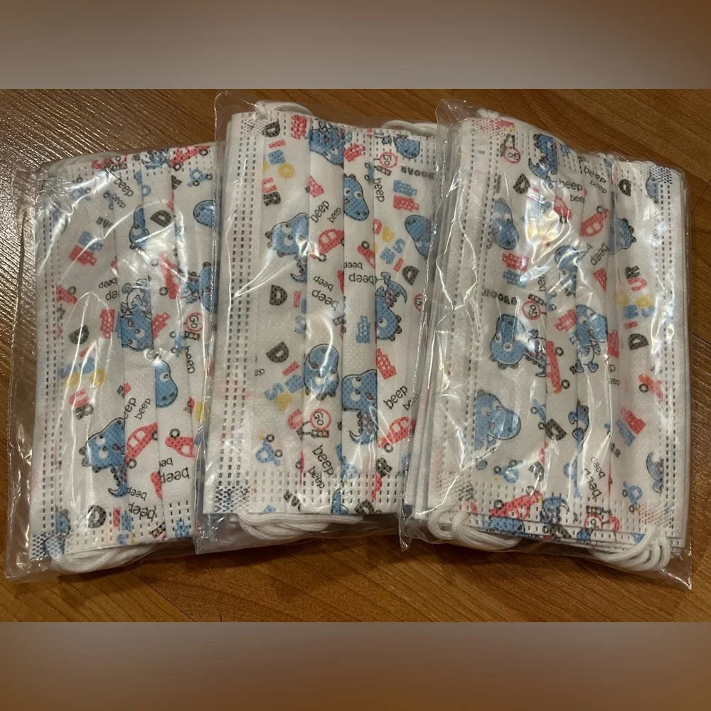 *New* Kids Face Masks 10 count - design: dinosaur